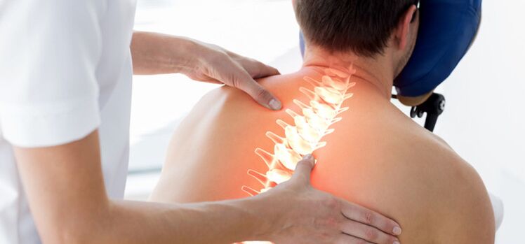 Osteochondrosis patient being examined by doctor